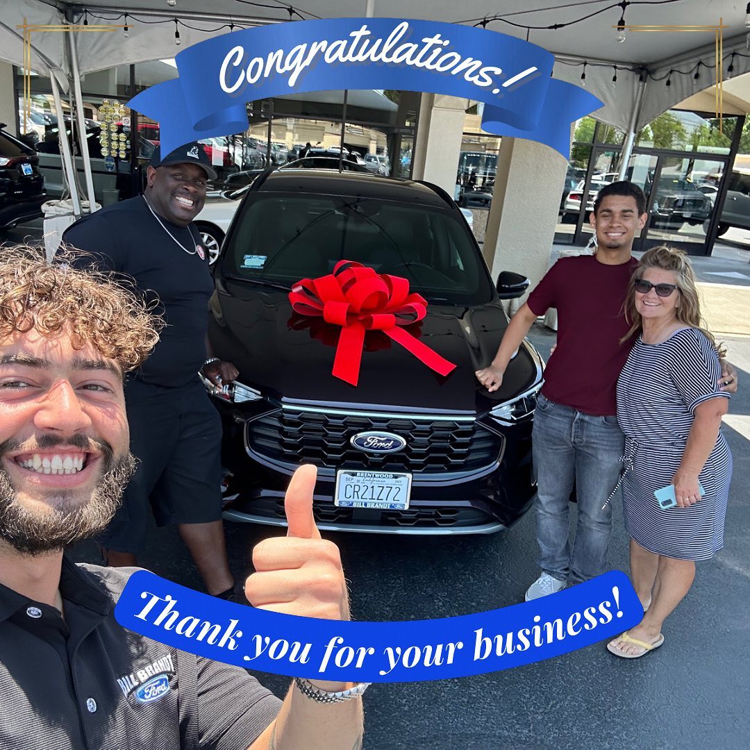 Mike handing keys to a Brentwood family — the moment they drive home